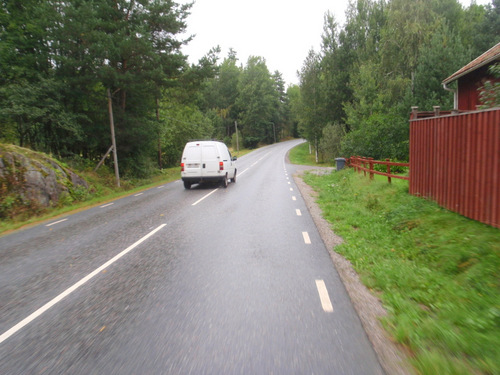 Automobile yielding a safe clearance.